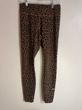 Woman’s medium Nike glitter cheetah leggings